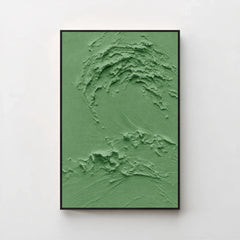 Creme No. 5 Green — forest green textured wave canvas print in a black gallery frame on a pale wall