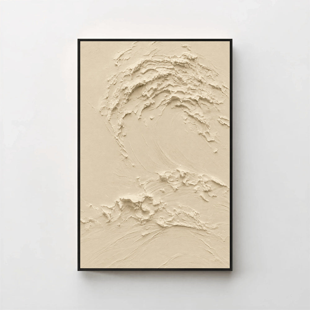 Creme No. 5 Greige — warm beige textured wave canvas print in a black gallery frame on a pale wall