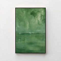 Harmonic Minimalism No. 27 Green — forest green seascape canvas print in a black gallery frame on a pale wall