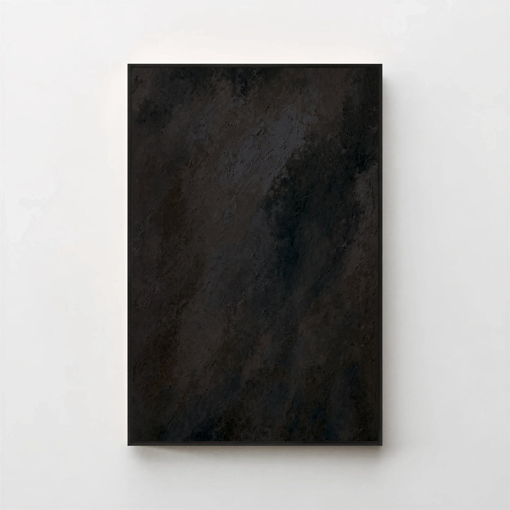 Harmonic Minimalism No. 1 Noir — dark charcoal gradient canvas print in a black gallery frame on a pale wall