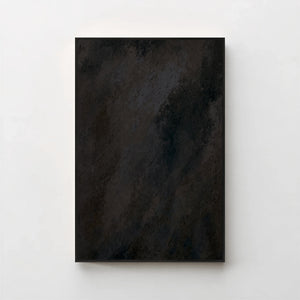 Harmonic Minimalism No. 1 Noir — dark charcoal gradient canvas print in a black gallery frame on a pale wall