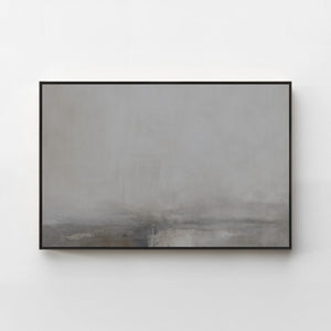 Harmonic Minimalism No. 31 Graphite — grey horizontal landscape canvas print in a black gallery frame on a pale wall