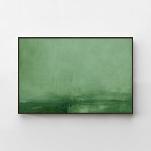 Harmonic Minimalism No. 31 Green — forest green horizontal landscape canvas print in a black gallery frame on a pale wall