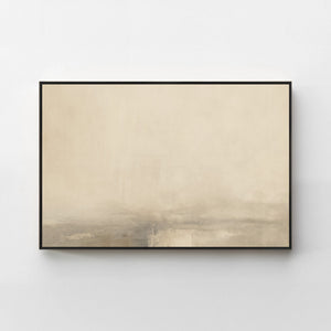 Harmonic Minimalism No. 31 Greige — warm greige horizontal landscape canvas print in a black gallery frame on a pale wall