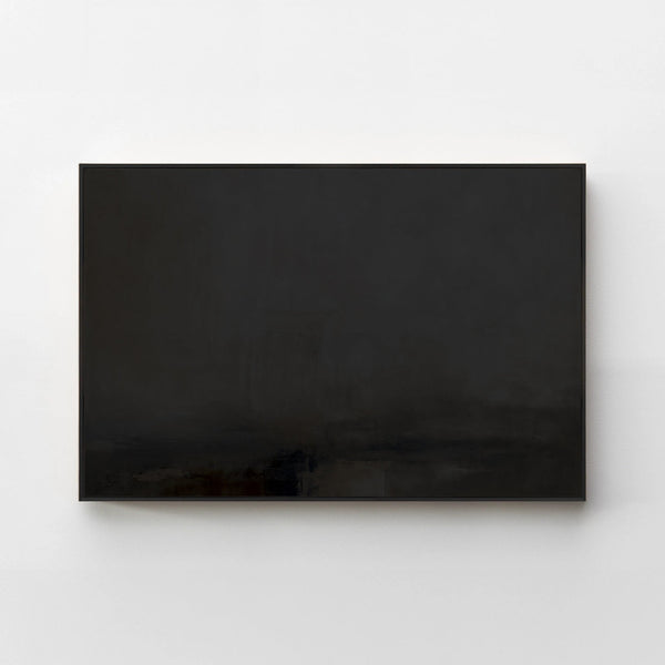 Harmonic Minimalism No. 31 Noir — dark horizontal landscape canvas print in a black gallery frame on a pale wall